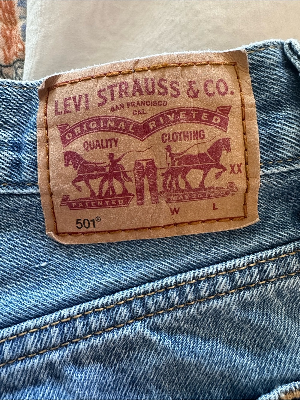 Levi's Distressed Light Blue High-Rise Jean Shorts - Picture 3 of 6
